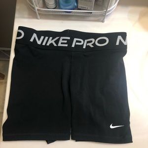 Black Nike Pros.